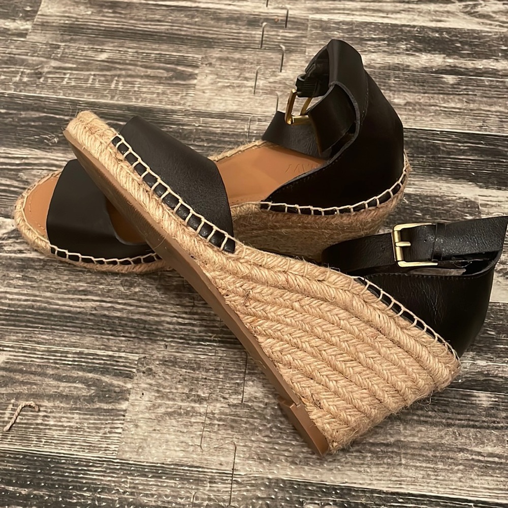 Black wedge sandals. Good used condition.